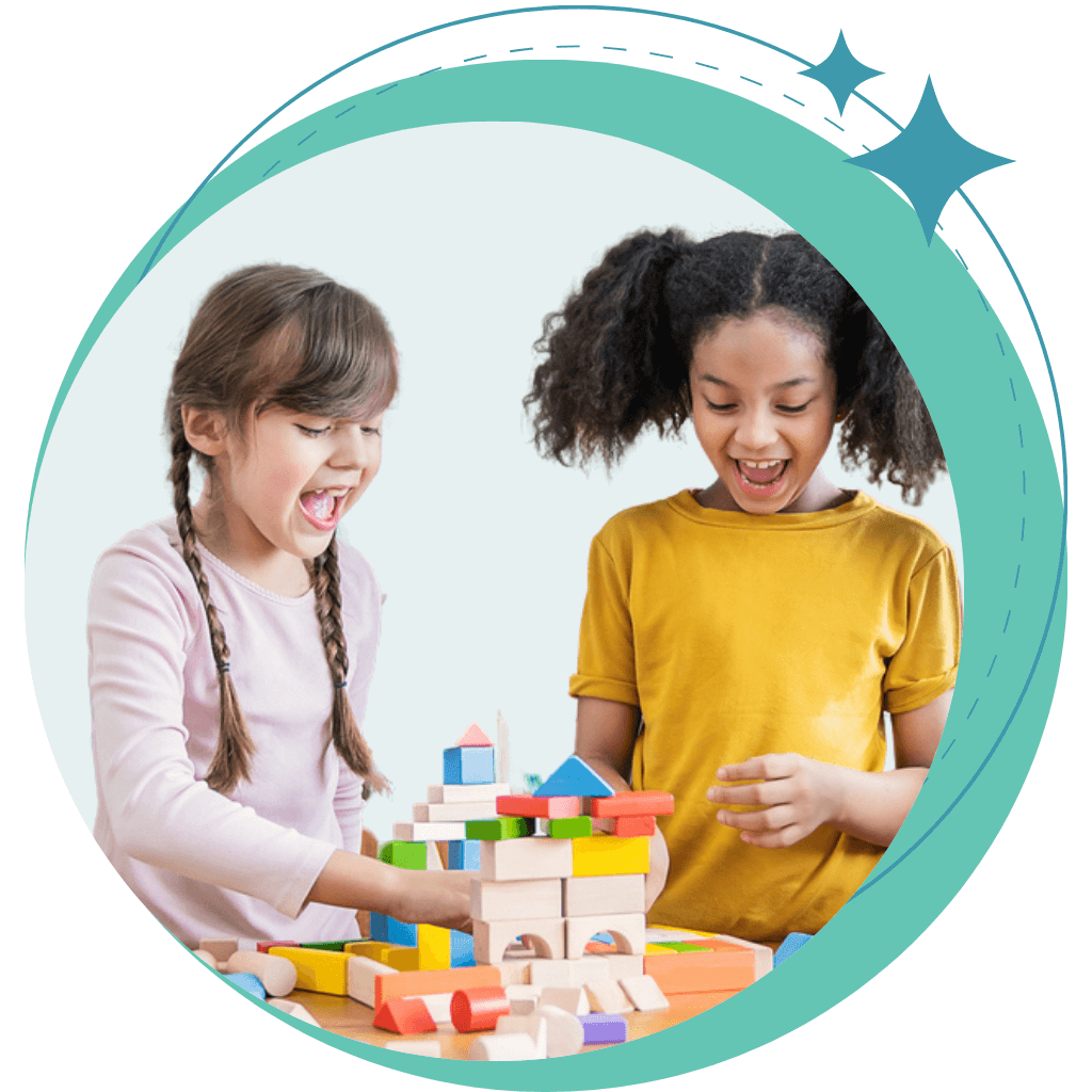 Caucasian and Afro american girls playing with wooden cubes on a table