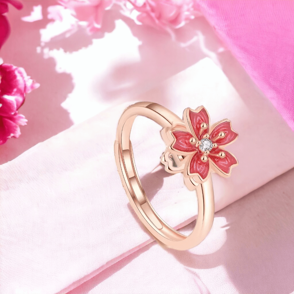 Cherry blossom ring with spinning top rose gold on white background