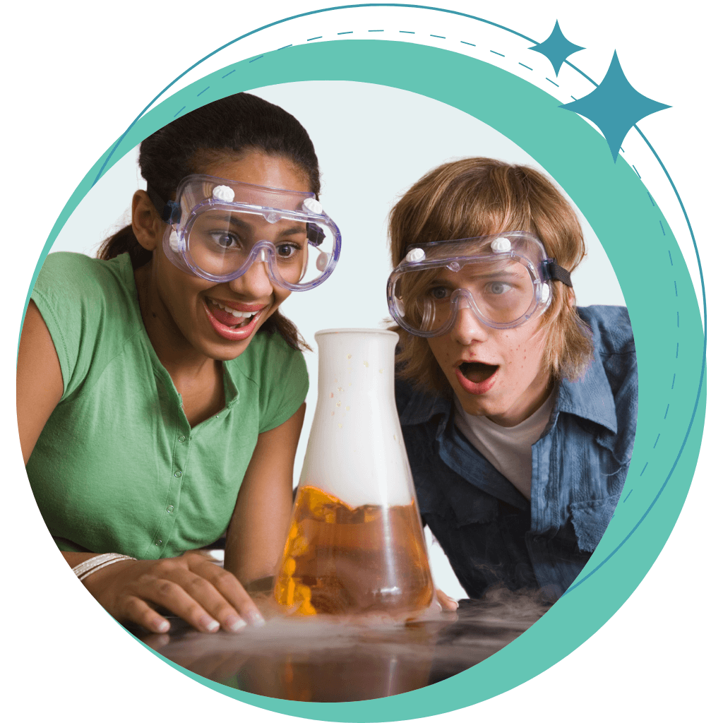 Teenage girl and boy wearing googles performing a chemistry experiment