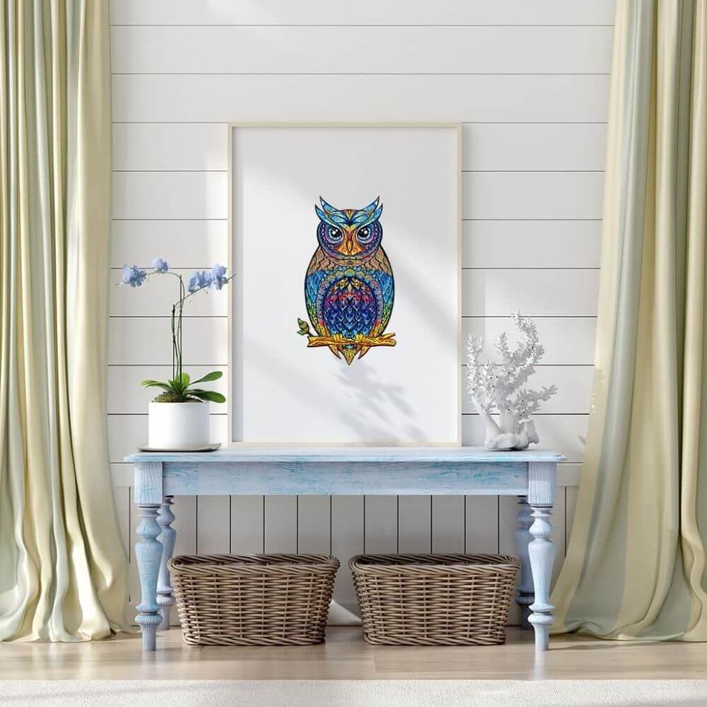 Framed owl wooden puzzle mounted on a wall