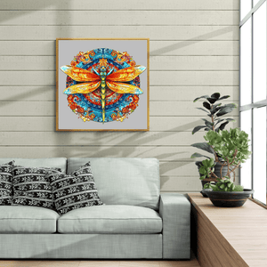 Adult puzzle round dragonfly mandala mounted on a living room wall above a white sofa