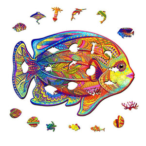 Adults puzzle fish with animal shaped pieces on white background