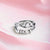 Anxiety ring with beads silver on pink fabric
