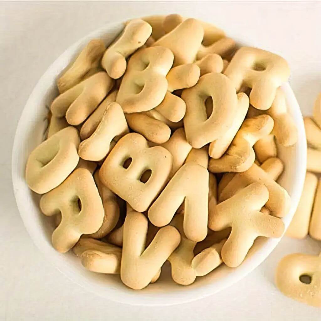 Baked cookie cut with alphabet cookie cutters