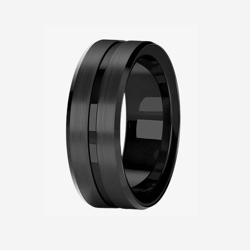 Black titanium ring on white background