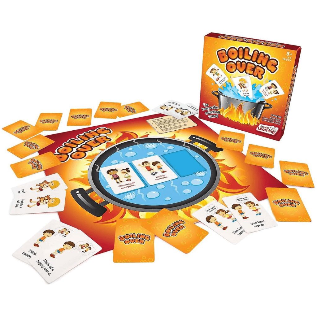 Boiling over board game by Junior Learning box and contents on white background