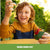 Boy with curly ginger hair playing with green Playfoam Naturals Shape & Learn Letters & Numbers at a yellow table