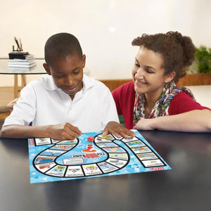 Boy and woman playing 6 Comprehension Games by Junior Learning at a wooden table