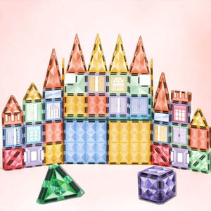 Castle made of pastel magnetic tiles on pink background