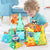 Jungle animals toy set with transparent figures and packaging on a white background