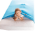 Caucasian girl in bed under a blue compression sheet