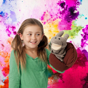 Caucasian girl holding a snail puppet from Folkmanis on colored background