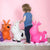 Caucasian toddler next to Happy Hopperz  animal hoppers