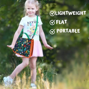 Caucasian toddler girl wearing a busy book in Australia on a forest background