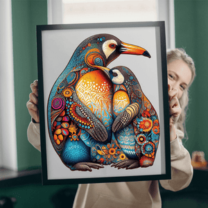Caucasian woman holding a framed wooden puzzle with penguins