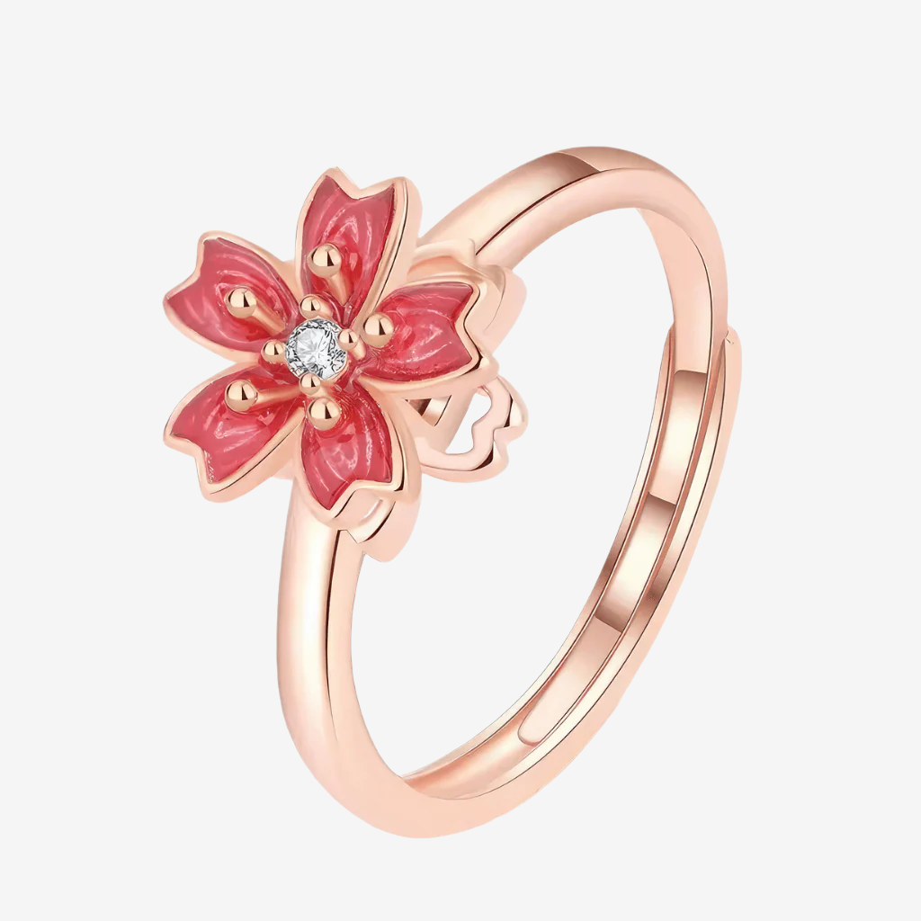 Cherry blossom ring with spinning top rose gold on white background