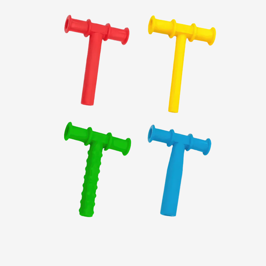 Chewy tubes red, yellow, blue, green on white background