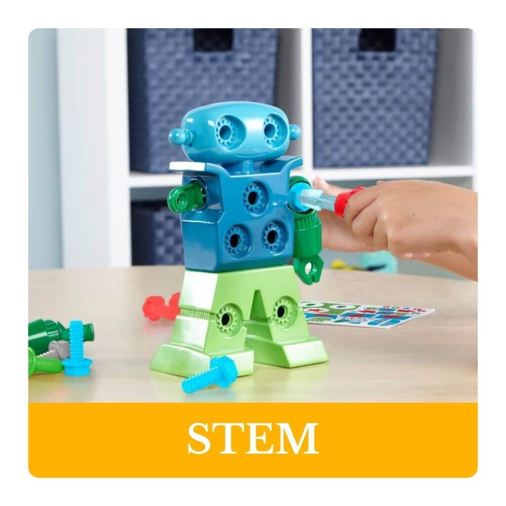 Children's toy robot being assembled on a table with 'STEM' label