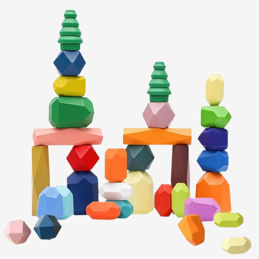 Colorful wooden stacking stones on white background