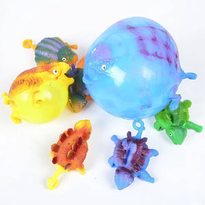 Coloured blow up buddies on white background