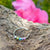 Colourful-enamel-ring-with-beads-tree-trunk