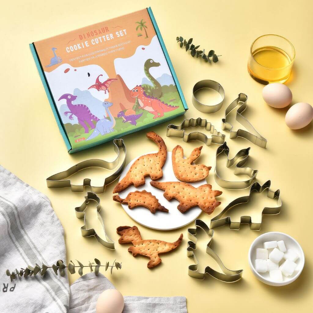 Eight dinosaur cookie cutters and box