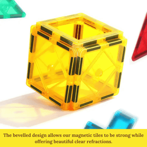 Cube made of yellow magnetic tiles for building on white background