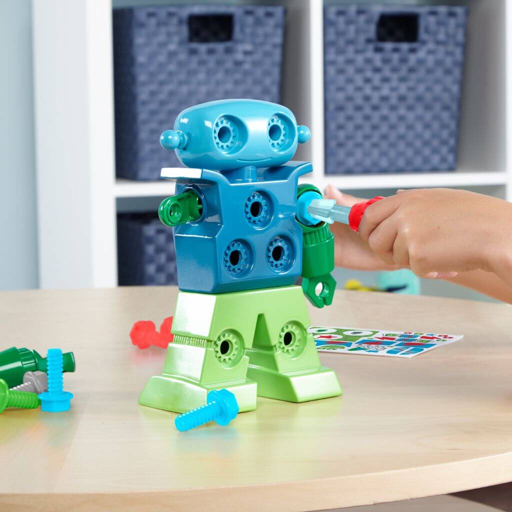 Design and Drill Robot by Educational Insights under construction on a wooden table