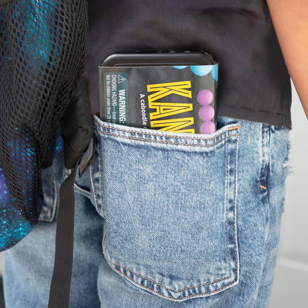 Educational Insights Kanoodle brain-twisting puzzle game in jeans back pocket