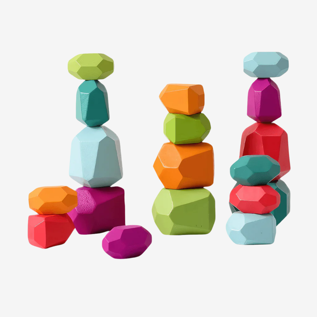 Eighteen bright wooden stacking stones on white background