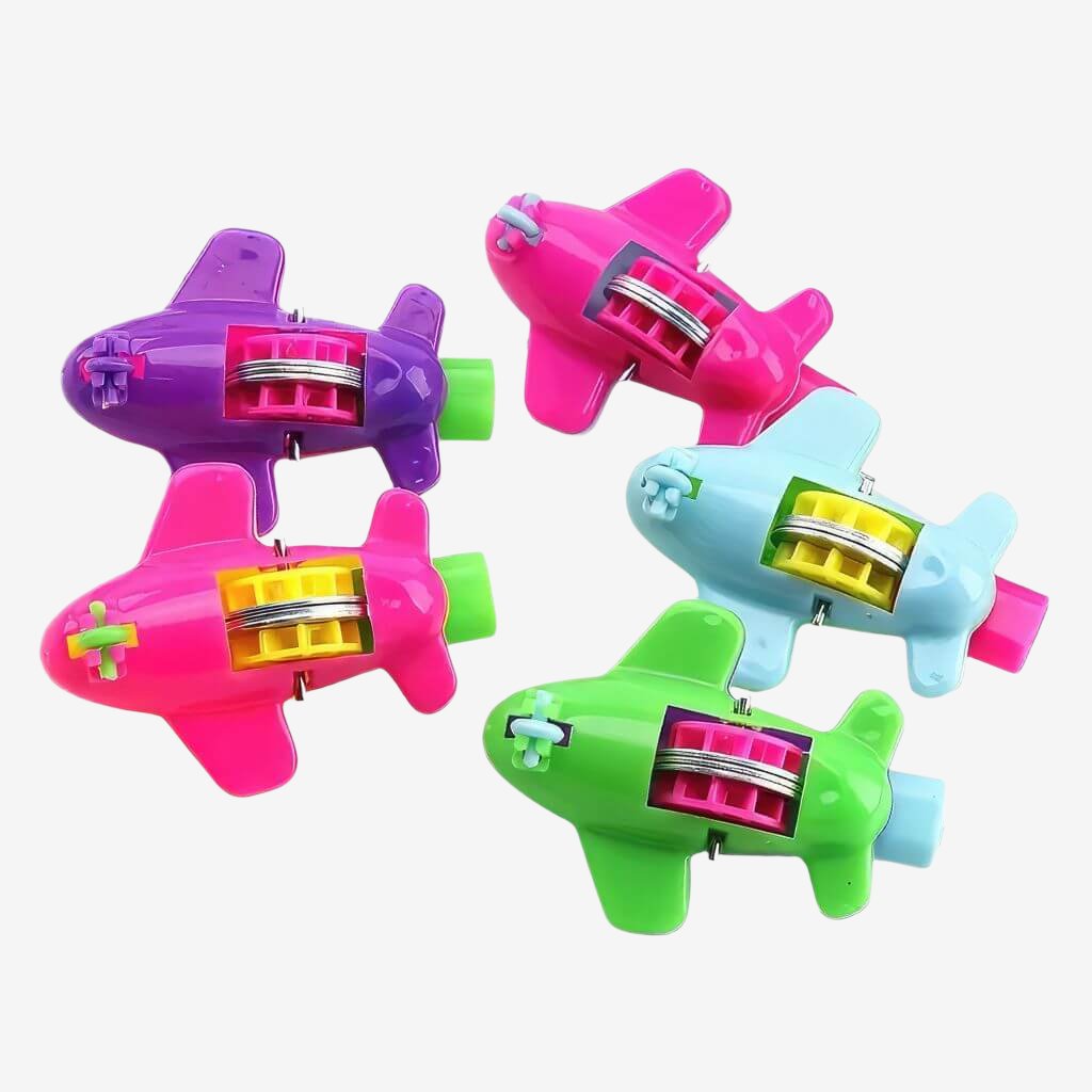 Five airplane whistles on white background