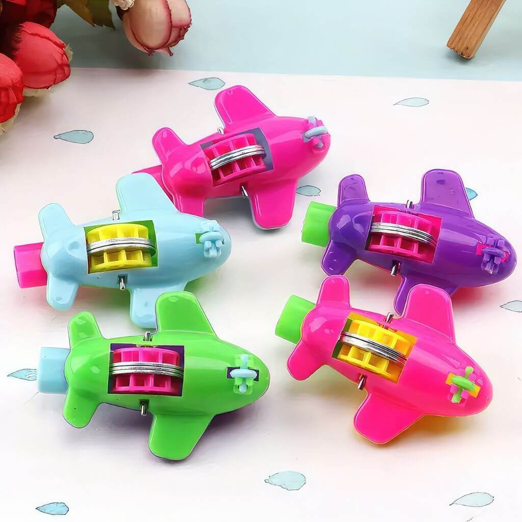 Five airplane whistles on white background