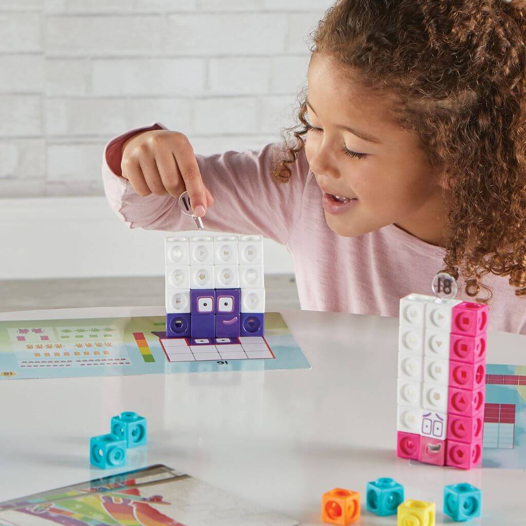 Hand two mind numberblocks mathlink cubes eleven to twenty activity set box and contents on white background