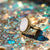 Gold shell rotating ring on a shiny surface