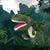 Green dinosaur hand puppet on white background
