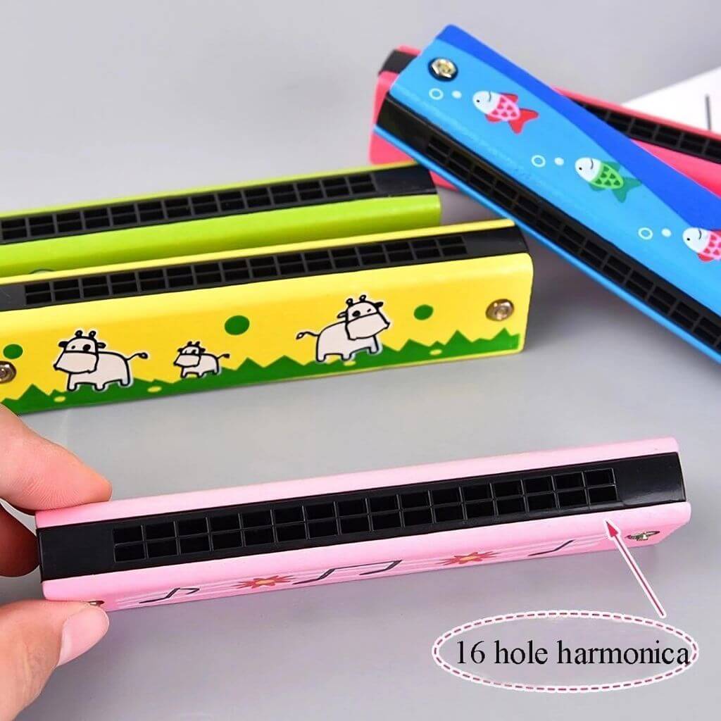 Multi colored wooden harmonicas for kids on a white background
