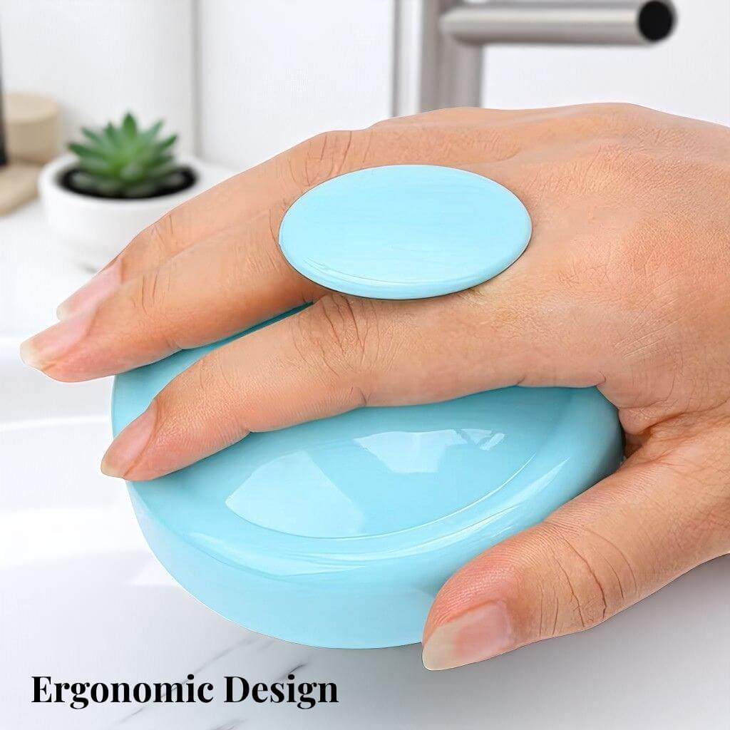 Hand holding a scalp massager