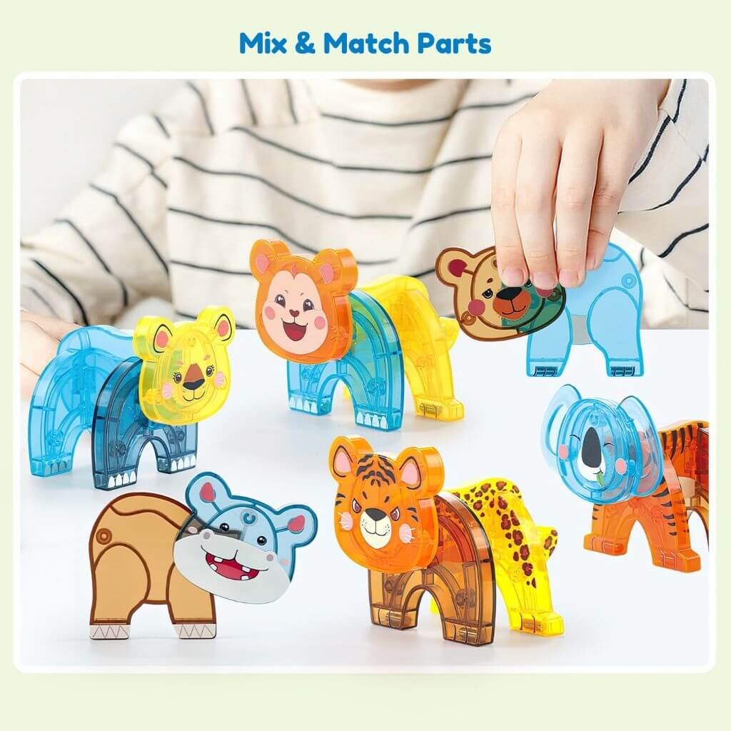 Hands playing with magnetic tiles jungle animals