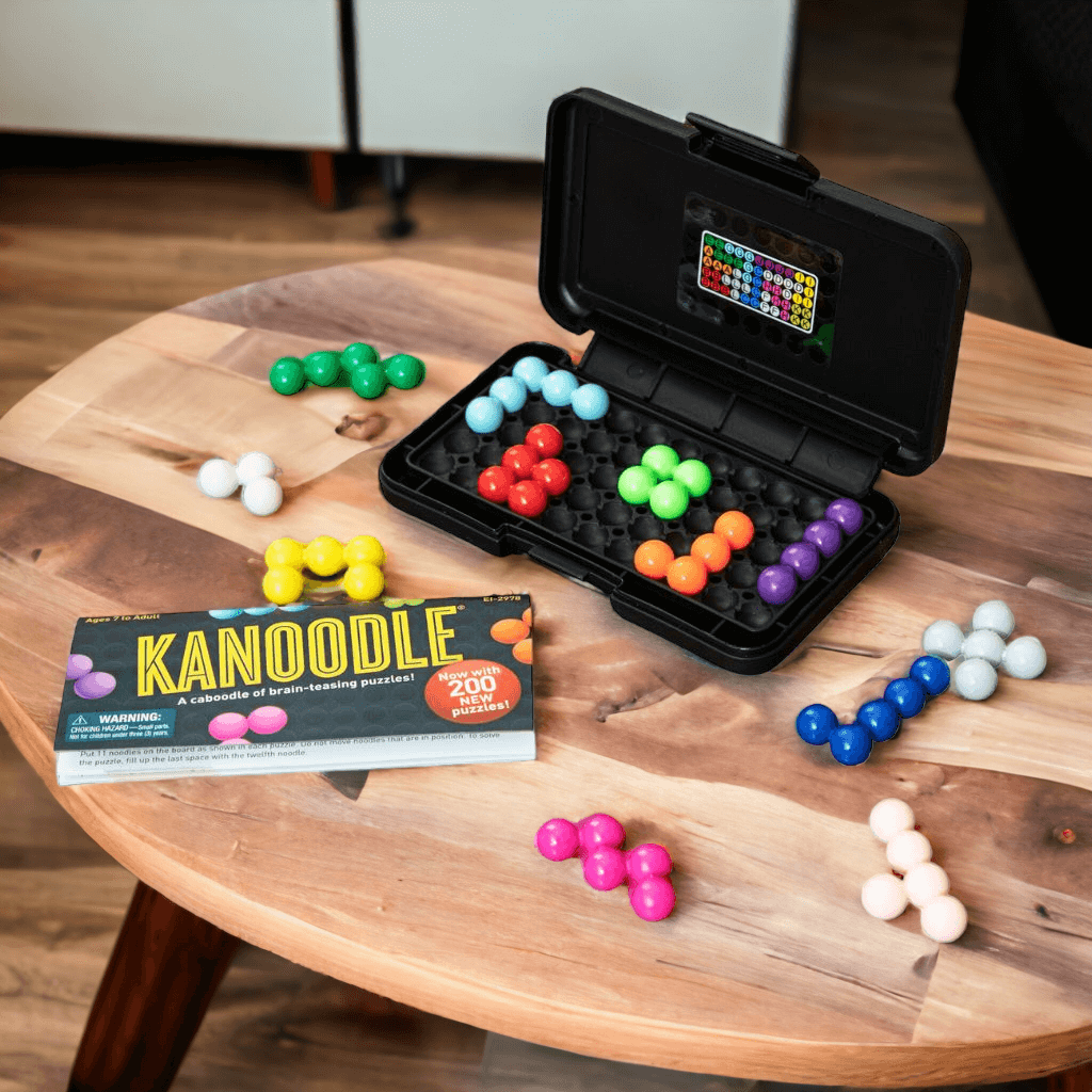 Kanoodle brain-teasing puzzles game by Educational Insights on a wooden table