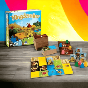 Kingdomino board game by Blue Orange box and contents on a wooden table