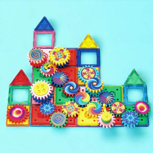 Magnetic children's toys with gears on a blue background
