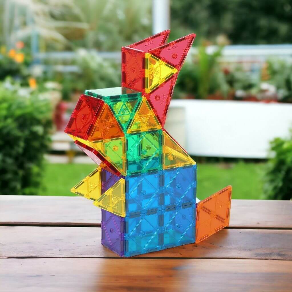 Magnetic tiles ideas rabit on a wooden table and green background