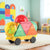 Magnetic tiles car set and box on white background