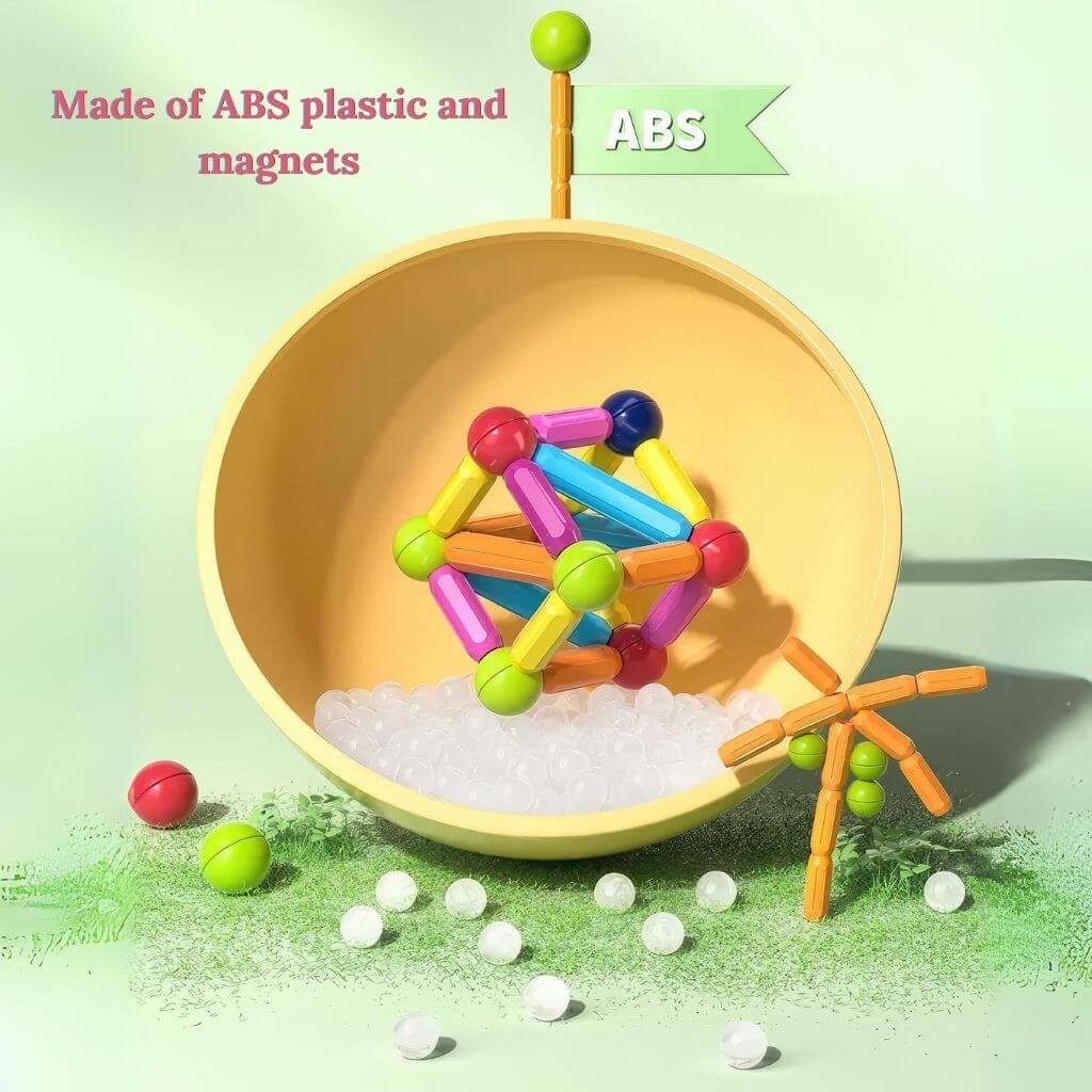 Magnetic toy for building with balls and rods on an orange plate and green background