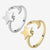 Moon and star ring in gold and silver on white background