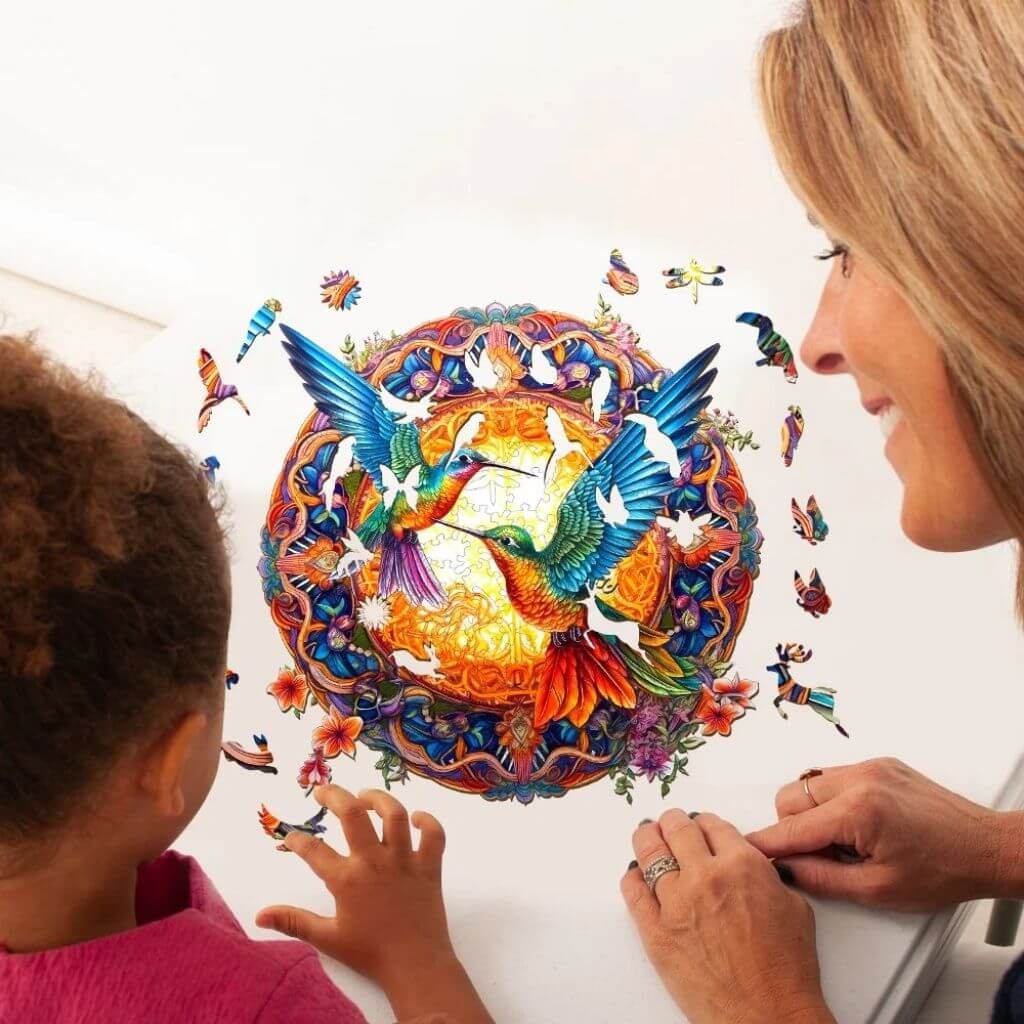 Mother and daughter making a hummingbirds round jigsaw puzzle