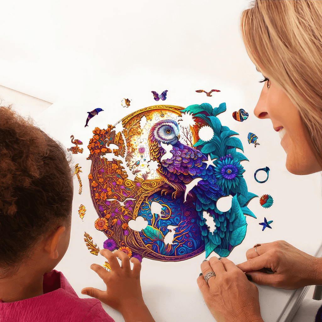 Mother and daughter making an owl round jigsaw puzzle