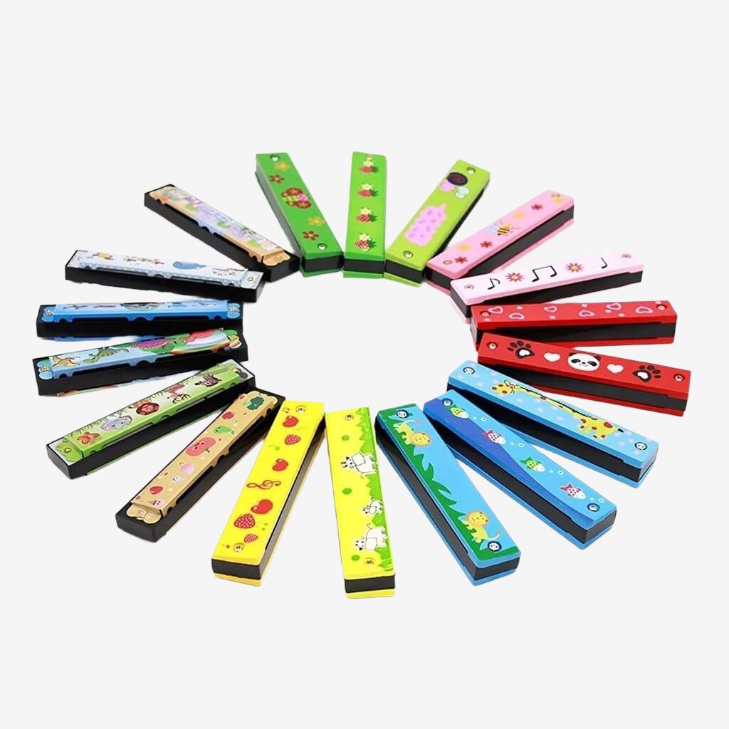 Multi colored wooden harmonicas for kids on a white background