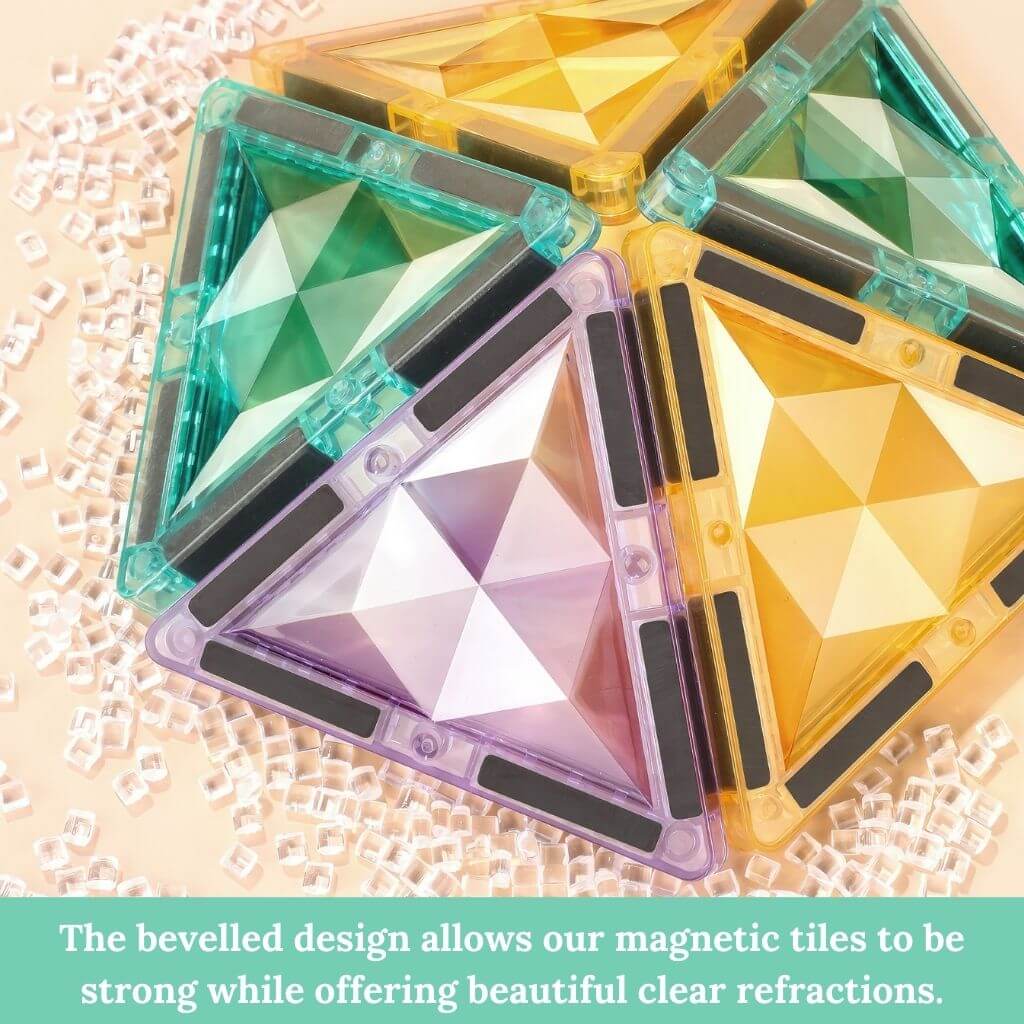 Pastel magnetic tiles pyramid on a beige surface