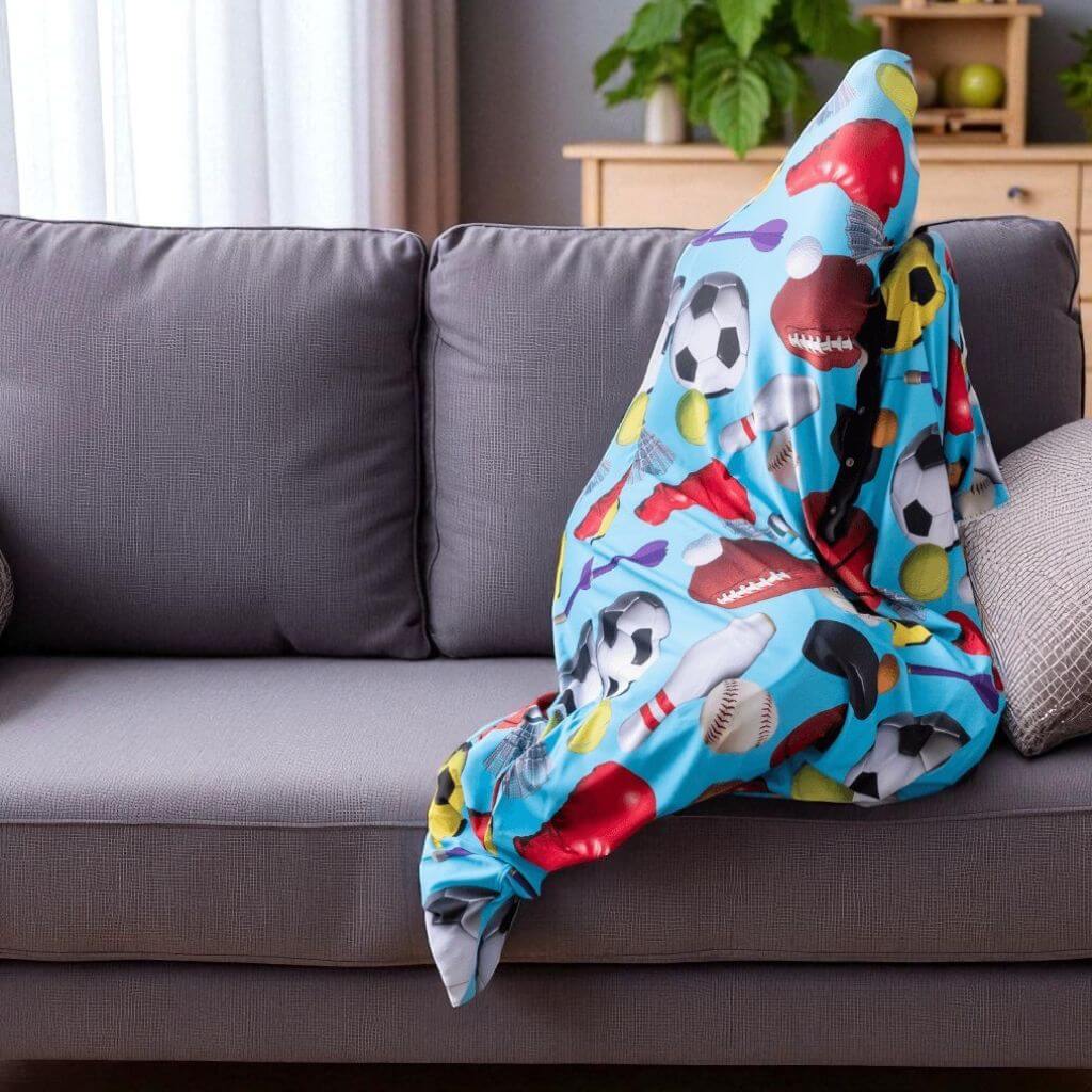 Person wrapped in a body sock lycra on a grey sofa